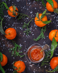 Tangerine jam in a glass jar.A traditional dessert at Christmas and New year.