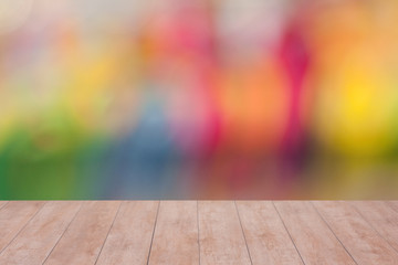 Wood table top on color abstract blurred background. ready for product display