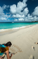 Fototapeta na wymiar Merry Christmas from the Caribbean beach