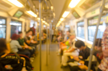 Blurred photo of passengers in sky train