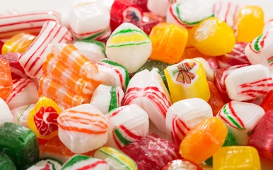 Tuinposter Assorted mix of colorful, hard, old time Christmas candy © Mat Hayward