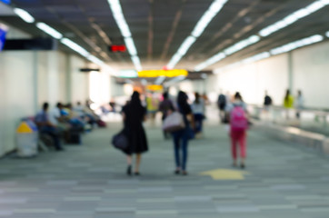 Passengers in Airport on blur background