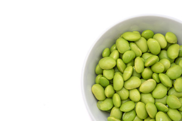 Soybean in the cup isolate on white background