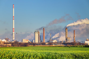 Oil refinery with vapor - petrochemical industry.