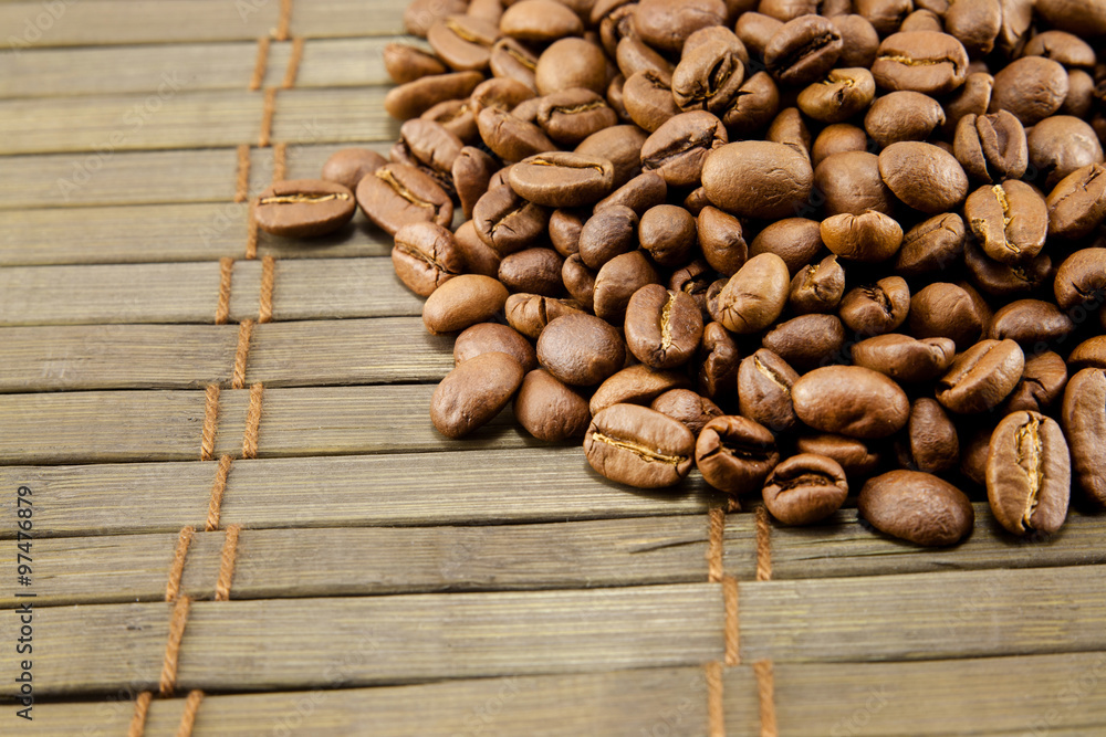 Wall mural Coffee beans on vintage wooden board