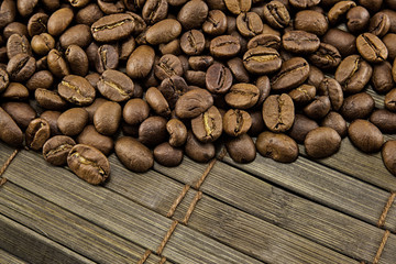 Coffee beans on vintage wooden board