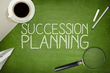 Succession planning concept on blackboard