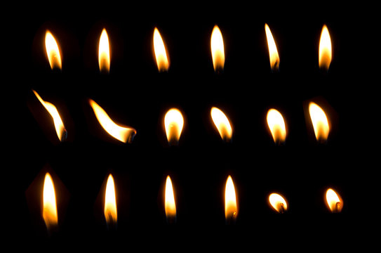 set of frame light candle burning brightly in the black background