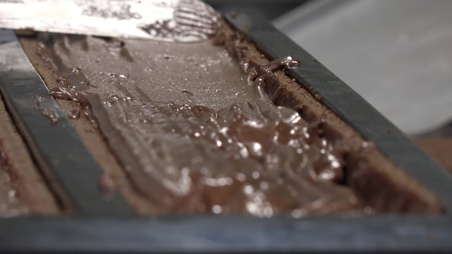 Preparation of a Yule log, pear and praline