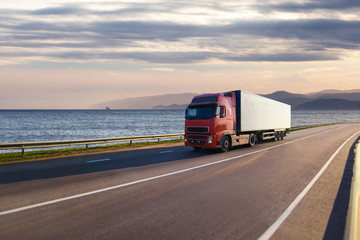 Fototapeta na wymiar Truck on a road near the sea