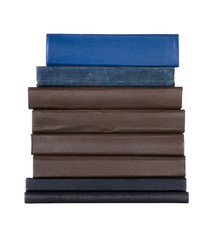 Stack of old books isolated on white background