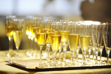 Champagne flautes prepared for a wedding reception
