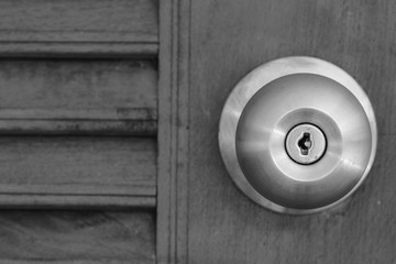 doorknob with wooden door - obrazy, fototapety, plakaty