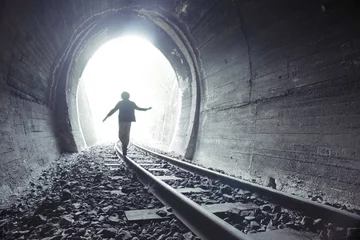 Foto op Aluminium Child walking in railway tunnel © Deyan Georgiev