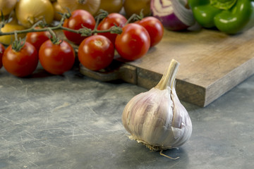 various vegetables on wooden cutting board