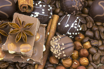 Obraz na płótnie Canvas chocolate, coffee, spices and nuts