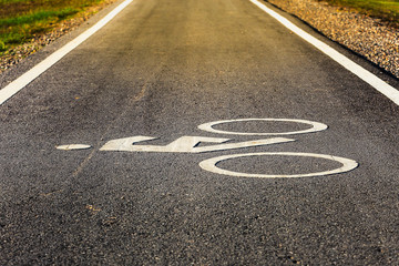 Obraz premium Road sign for bikes and cyclists outdoors.