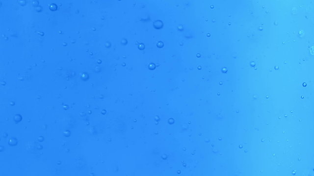 Slowmotion of Zooming In Perfect Bubbles in Water Accending to the Surface