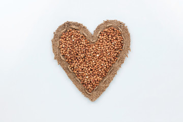 Buckwheat  lies at the heart made of burlap