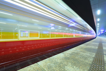 Train in motion at the station