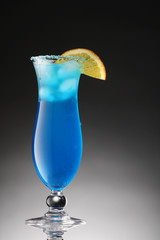 colorful cocktail garnished slice of orange