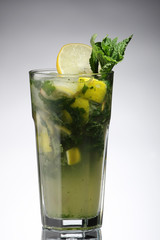 mojito with ice in a sweaty glass