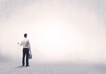 Elegant person standing with his back