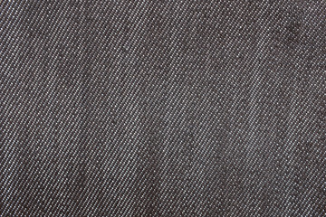 Fototapeta na wymiar Detail of denim jean texture and seamless background