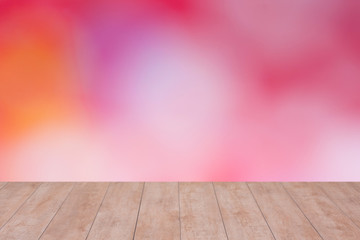 Wood table top on color abstract blurred background. ready for product display