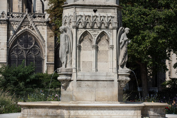 Paris - Fountain of Virgin in Square Jean XXIII near east side of Cathedral Notre Dame