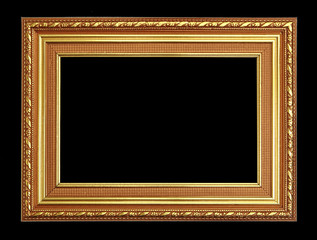The antique gold frame on the black background