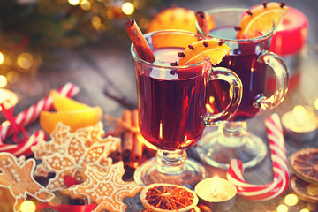 Traditional Christmas mulled wine hot drink. Holiday decorated Christmas table