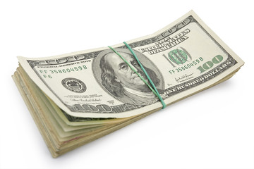 Stack of banknotes in 100$ note isolated on white. Clipping path incl.
