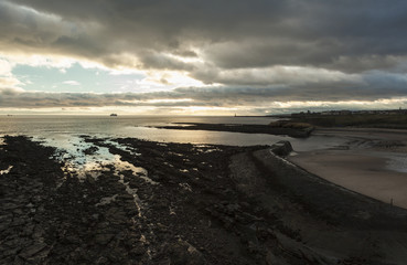 Cullercoats Bay, North Tyneside, England, UK. At dawn and at low tide.