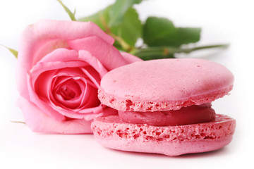 Obraz na płótnie Canvas Happy Mother's Day macaroon a gentle pink rose isolated on white background Valentine's Day love tenderness