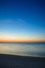 Fototapeta na wymiar Minimalistic seascape at twilight