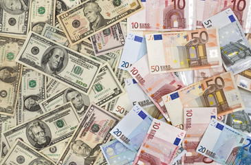 Obraz na płótnie Canvas Dollar and euro banknotes background