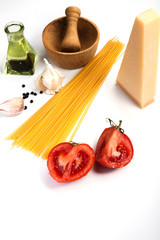 
Spaghetti ingredients on a white background