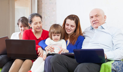 multigeneration family  together with few devices