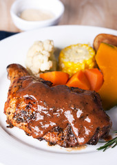 chicken steak with black pepper sauce and vegetable