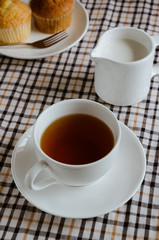 Cup of Tea with Milk and Cup Cake for Tea Break.