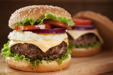 hambuger with pork grilled,egg fried and vegetable