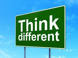 Education concept: Think Different on road sign background