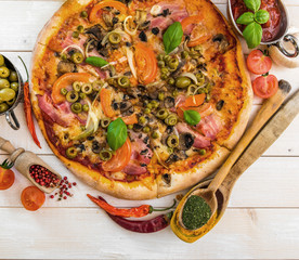 Pizza with ham and olives