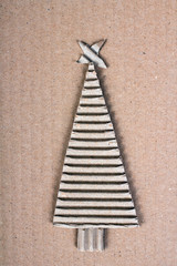 Christmas background with cardboard christmas tree