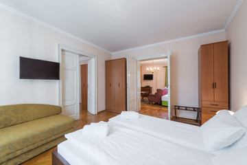 Fototapeta na wymiar Hotel room interior with double bed