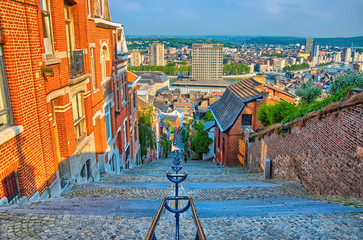 View over montagne de beuren stairway with red brick houses in L - obrazy, fototapety, plakaty