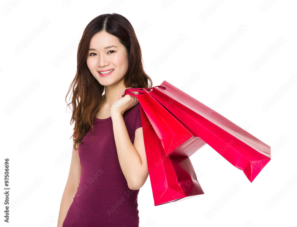 Wall mural Asian Woman hold with shopping bag