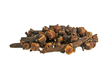 Heap of dried cloves on a white background
