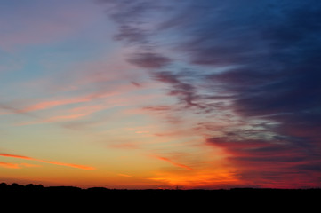 Fototapeta na wymiar saturated colors of the sky at sunrise